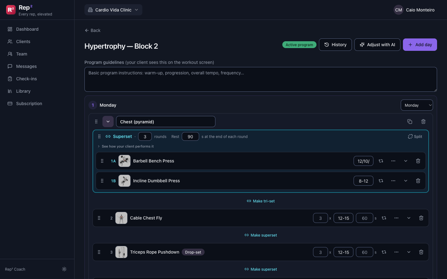 Real Rep² coach dashboard: the program editor for 'Hypertrophy — Block 2', with a chest day, a superset of bench press and incline dumbbell press, sets × reps and rest per exercise, plus History and Adjust with AI.